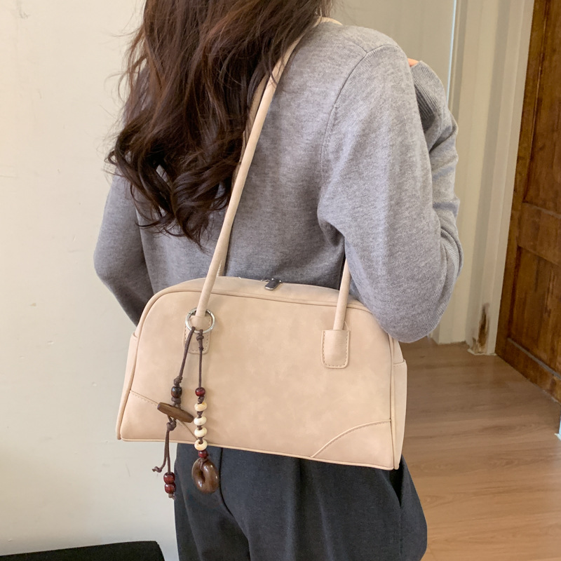 Bolsa de bolos de cuero de lona retro para mujeres 2025 invierno nuevo bolso de brazo de alta calidad bolso de almohada universal bolso de hombro image 2