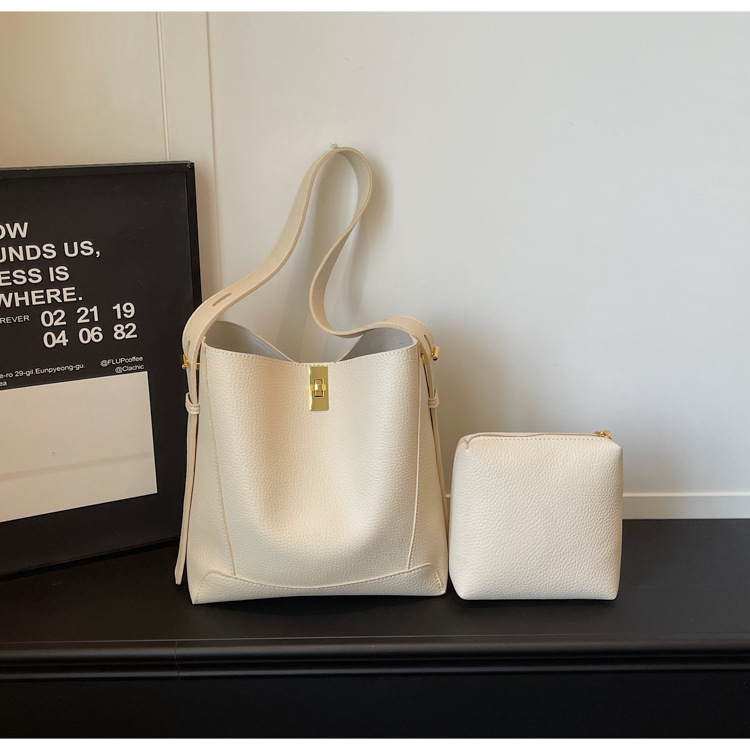 Bolso de mujer nicho sensación de alto nivel litchi estampado bolso de balde 2026 nuevo estilo de alta capacidad de moda bolso de hombro
