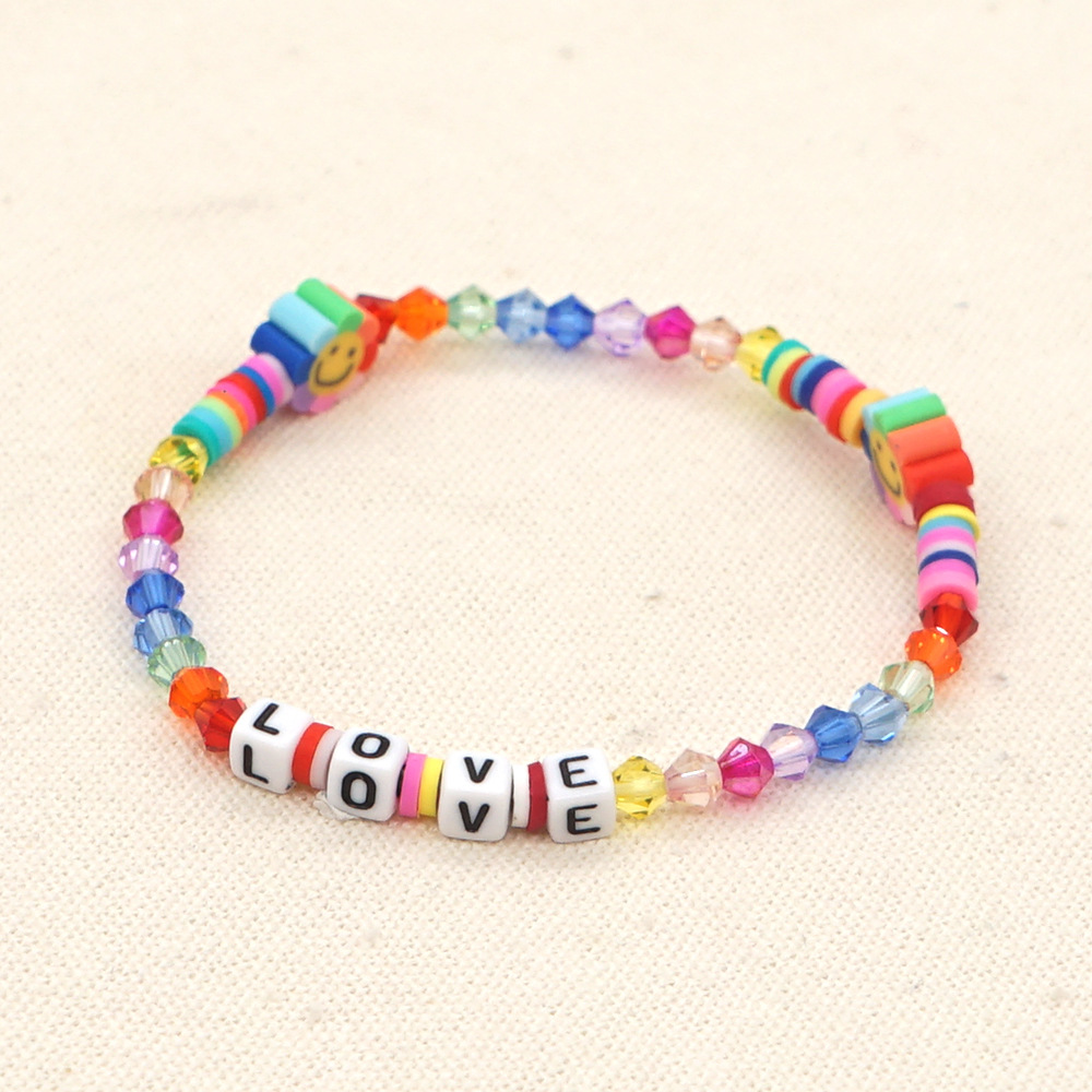 Nueva Pulsera De Apilamiento De Cuentas Hecha A Mano Con Cuentas De Arco Iris De Cerámica Suave Cristalina display picture 3