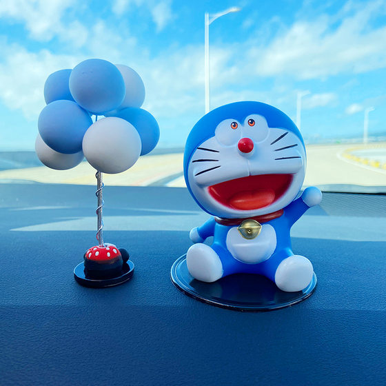 Online celebrity car decoration car cartoon accessories Doraemon sleeping Daxiong center console decoration car supplies for women