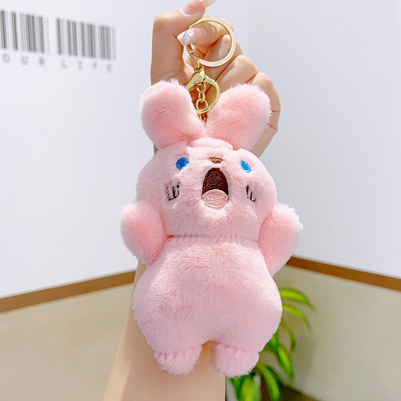 Cuatro pulgadas muñeca máquina colgante felpa llavero lindo muñeca mochila adornos grab máquina muñeca regalo al por mayor