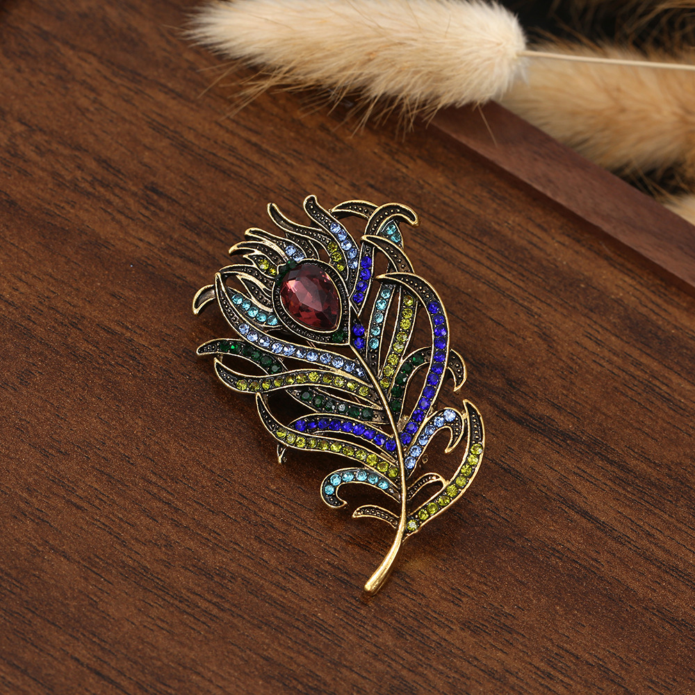 Enamel cardigan feather brooch vintage rhinestone brooch suit shawl coat anti-slip pin accessory for women