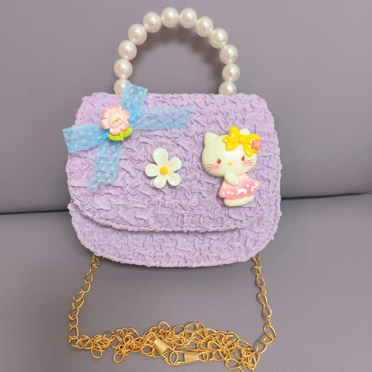 Bow Pearl Princess Handbag Meileti Kulomi Girl Año Nuevo Cartera pequeña bolsa de cadena de viento fragante