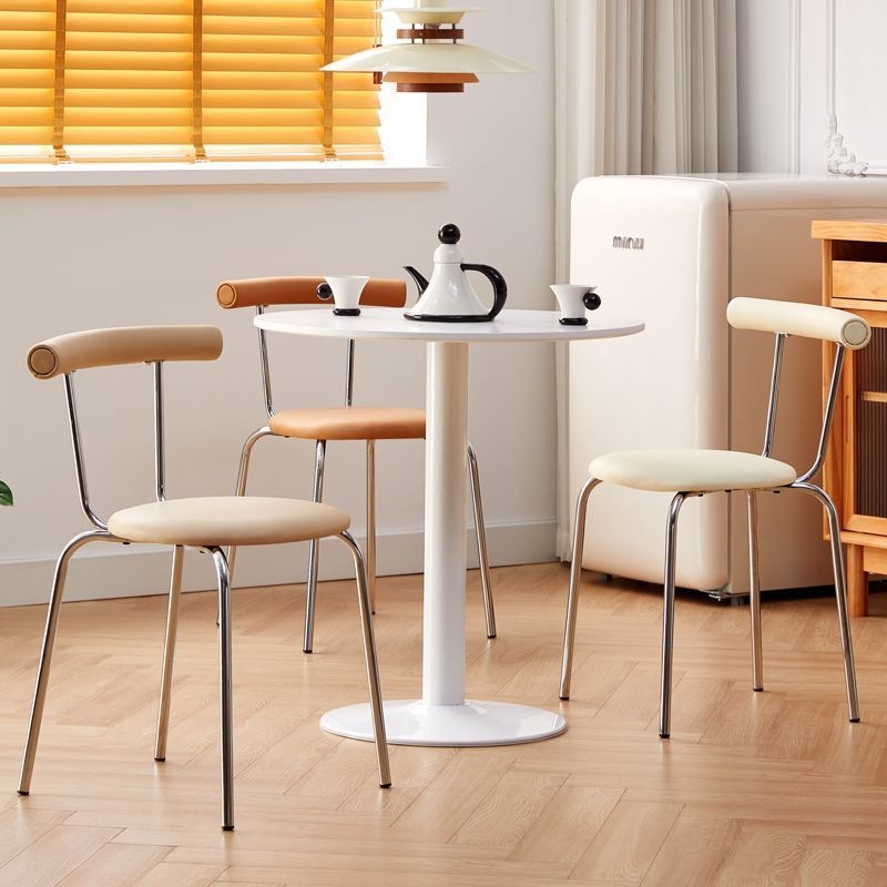 Silla de comedor doméstica simple silla de respaldo moderna retro nórdica silla de comedor de lujo pequeño tipo de alojamiento residencial se puede apilar mesa y silla de comedor