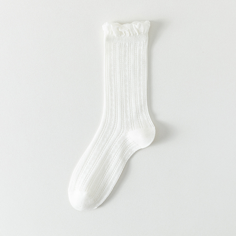 Calcetines de tubo medio Calcetines de algodón de color sólido para mujer delgada de verano Calcetines de confinamiento deshuesados Calcetines de pila de malla Calcetines de mujer Zhuji al por mayor