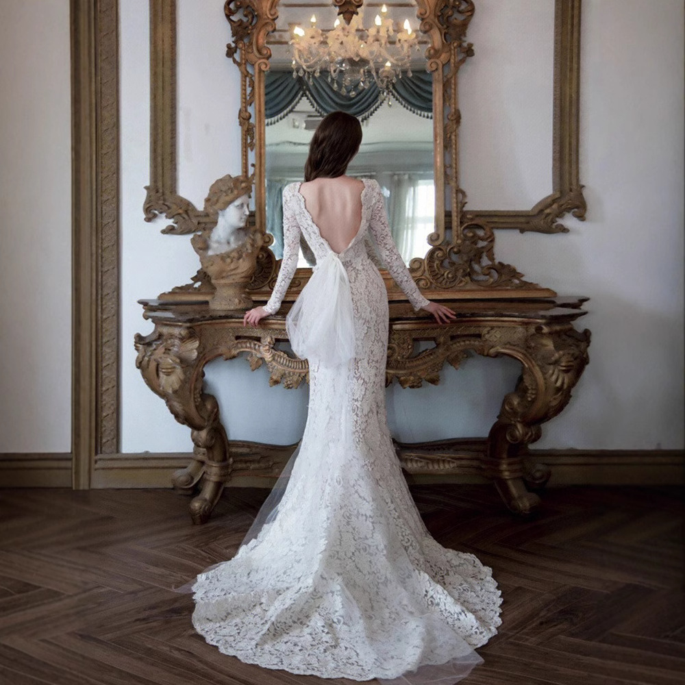 El comercio exterior de encaje francés de cola de pescado ligero vestido de boda 2024 nuevo vestido de novia de encaje de manga larga vestido de alta calidad