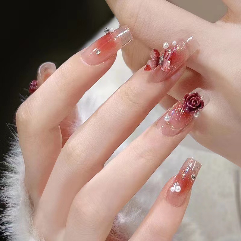 Manicura Nueva joyería retro negro Plum Salsa Camelia joyería arco perla clavo taladro conjunto caja