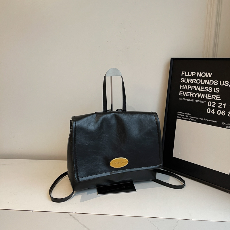 Textura avanzada de invierno de 2024 nueva versión coreana de la mochila retro para estudiantes universitarios mochila ocio