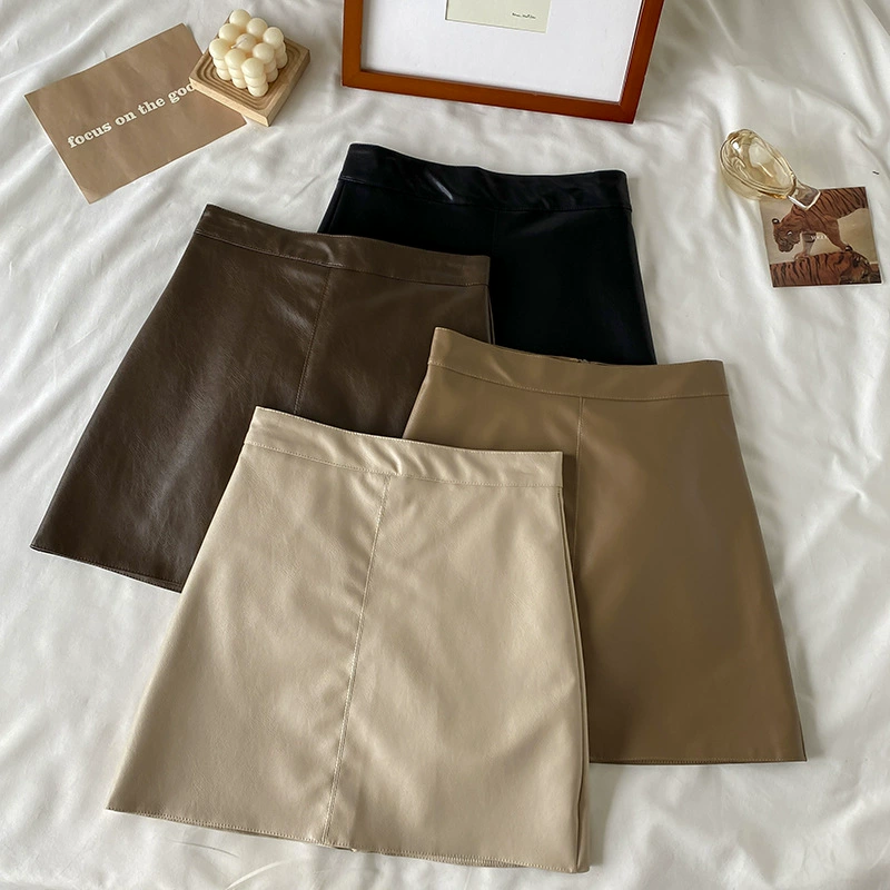 Черная Маленькая кожаная юбка, Женская весенне-осенняя новая утягивающая юбка из искусственной кожи с высокой талией, антиэкспозиционная бедренная юбка А-силуэта