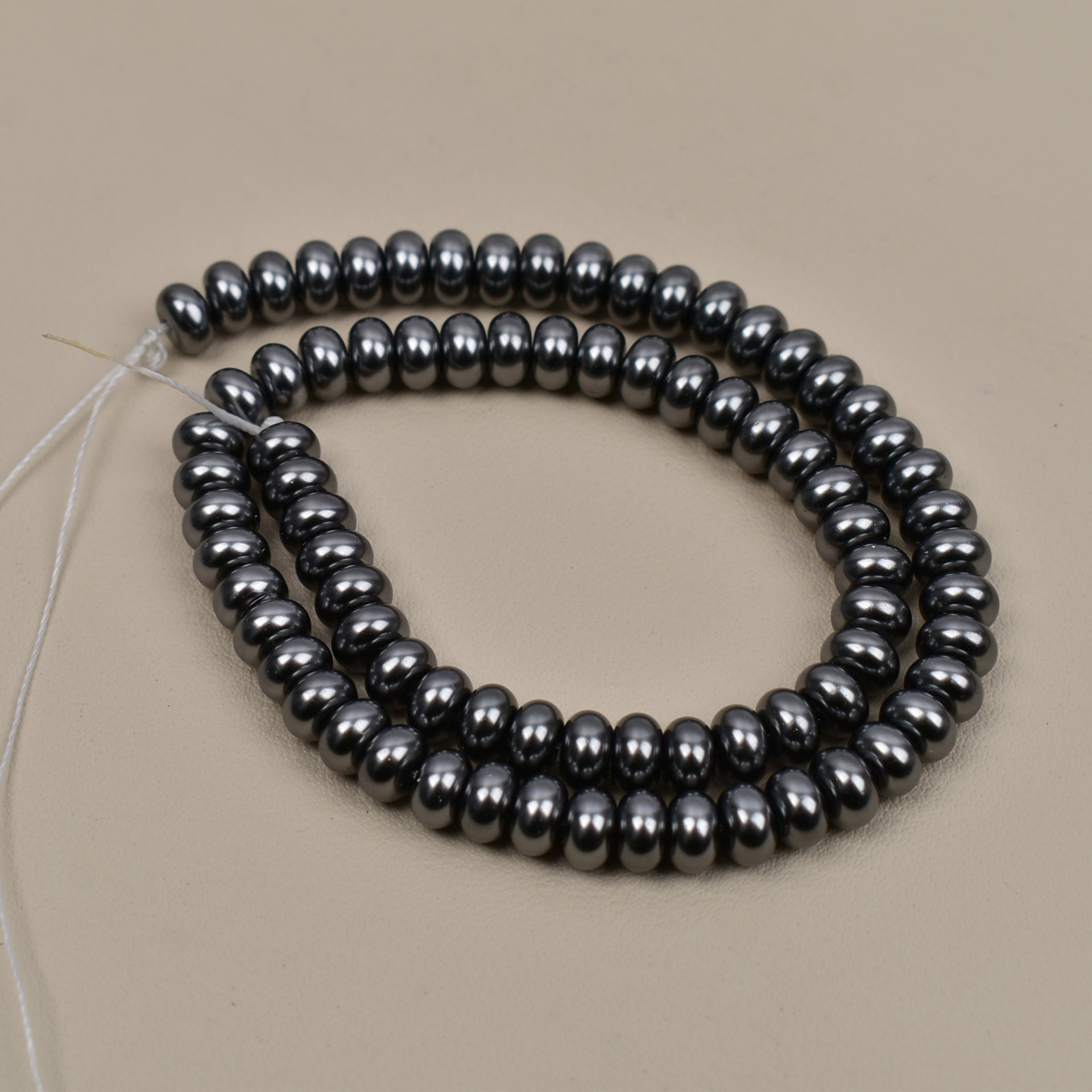 5*8mm dark gray / about 88 pieces in a string