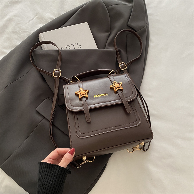 Mochila retro versátil para mujeres nicho diseño 2024 nueva moda alta textura mochila universitaria pequeña