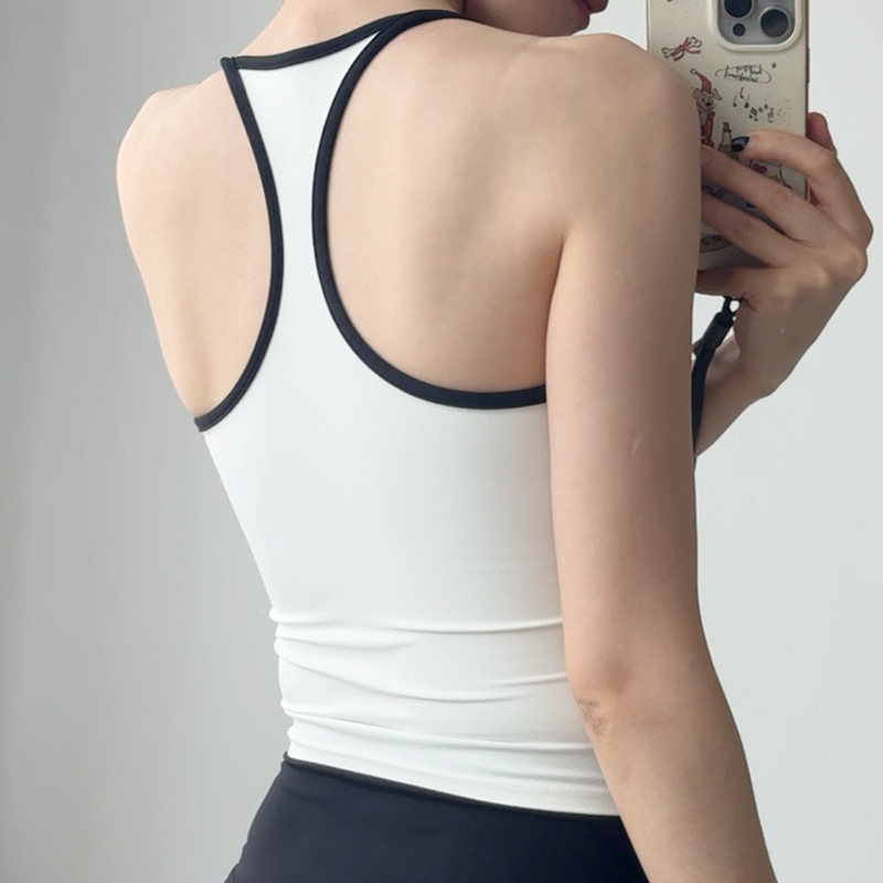 ヨガのベストの女性韓国のフィットネスは震動防止の細いベルトの一体の胸のパッドを集めて外にファッションの美背のランニングのブラジャーを着ます。