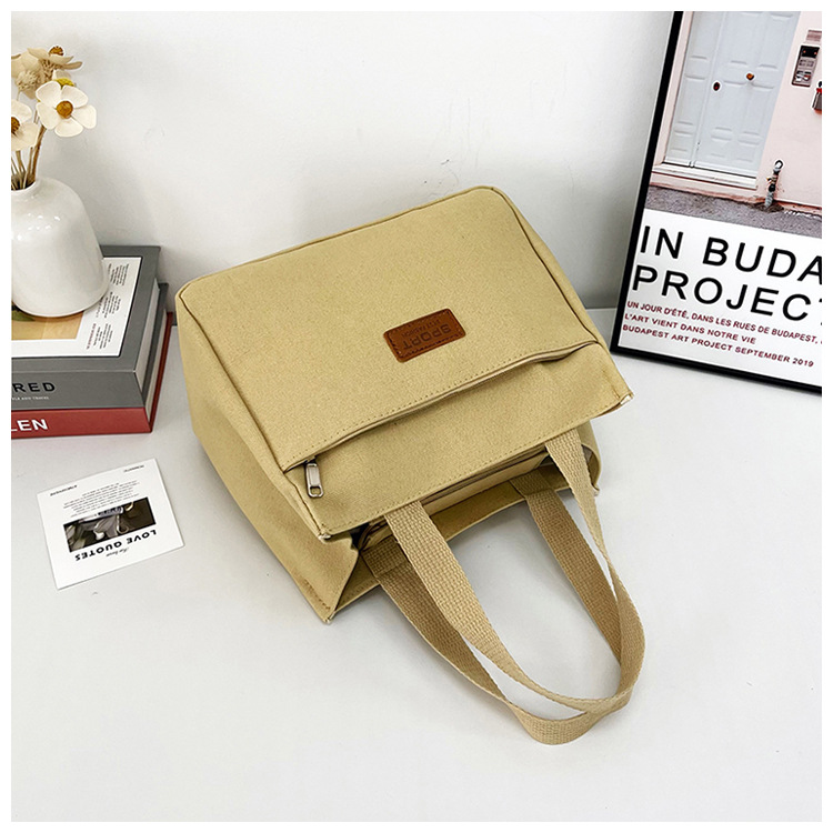 New wholesale fashionable and high-quality canvas handbag, simple and portable, easy to carry for going out, versatile lunch box and bento bag undefined