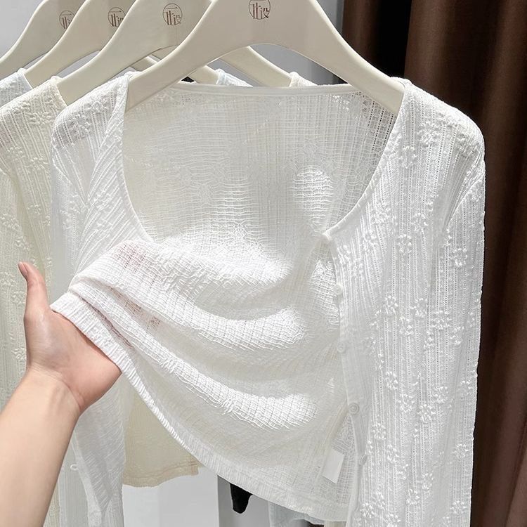 日焼け止めのジャカードのサスペンダーのスカートのカーディガンの外で夏の長袖の女性の薄い砂浜のショールを掛けて旗を合わせます。|undefined