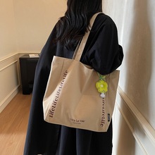 简约字母印花手提购物袋帆布包包2025新款百搭睿营休闲妈咪单肩包
