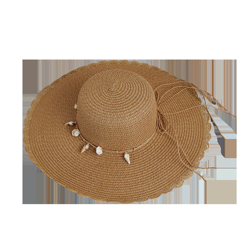 Sombrero de playa de ala ancha versátil a prueba de sol costero concha de encaje sombrero de paja que cubre la cara de las mujeres de moda estilo coreano sombrero fresco de moda Nuevo