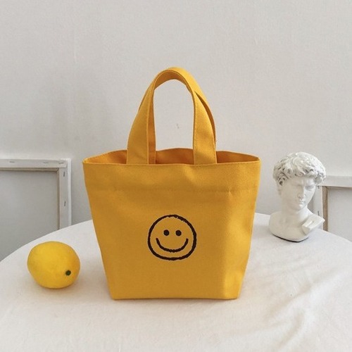 帆布包包新款可爱笑脸手提袋简约百搭便当包文艺小清新包包女