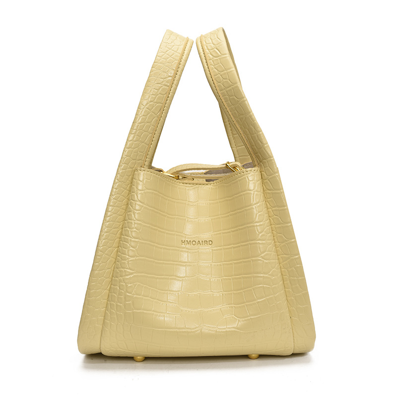 Bolso de cubo de mano de estilo explosivo con patrón de cocodrilo transfronterizo para mujer 2025 nuevo bolso de hombro con textura versátil bolso de mensajero súper caliente