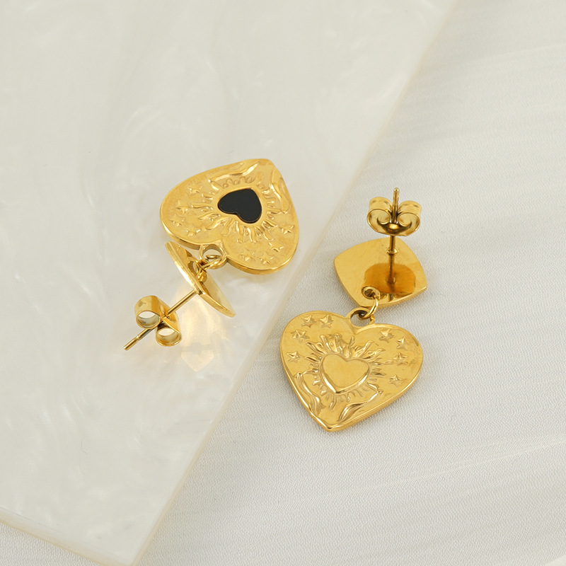 Pendientes de amor de aceite de goteo de lujo ligero de nuevo estilo, personalidad de moda femenina, colgante de corazón de melocotón, pendientes chapados en oro de 18 quilates, fabricante de sensación de alta gama