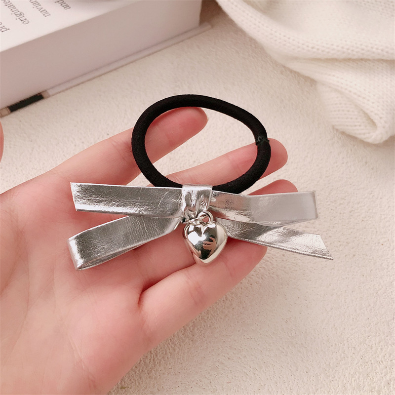 Coreano dulce cool girl plateado arco de cabello en nicho de alta sensación cuerda de cabello amor correa de cabello adornos para el cabello