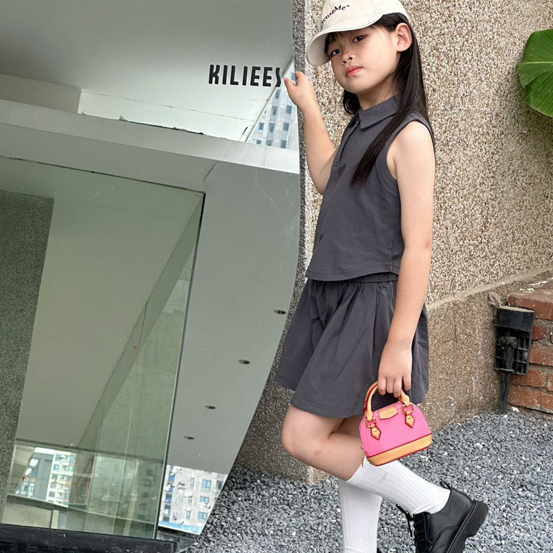 Bolsos de hombro coreanos para niños y niñas, bolsas de estilo de color extranjero, mini bolsas de conchas para niños, 2024 nuevas bolsas de comercio exterior para niños