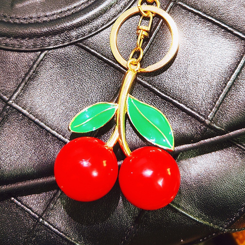 Creativo lindo diamante fruta pequeño limón llavero del coche bolso de las mujeres colgante de metal llavero anillo de regalo de dibujos animados