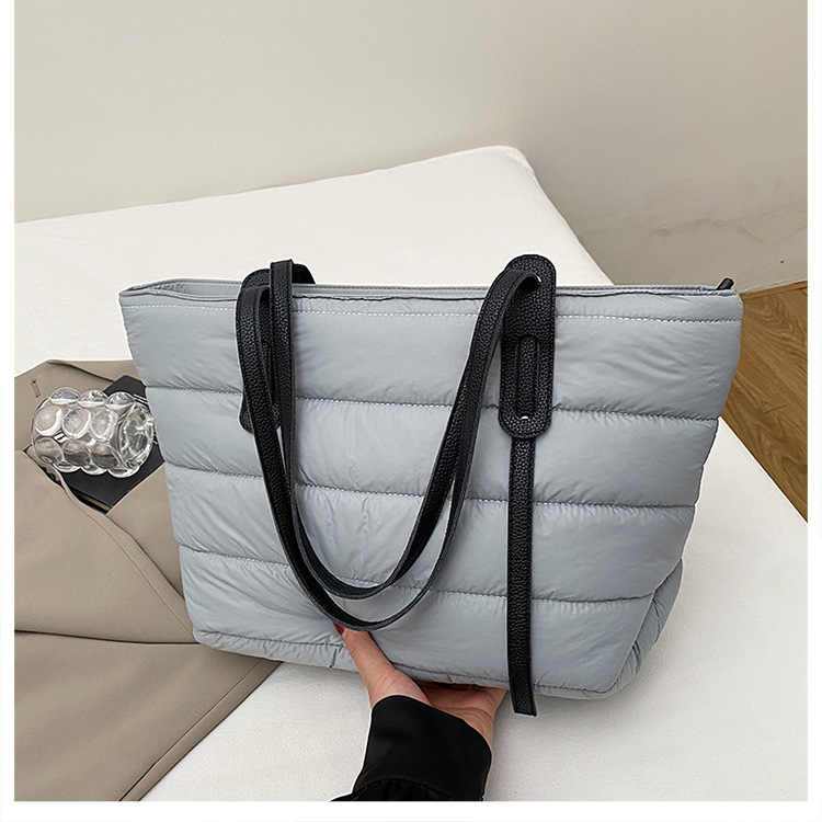 Große Kapazität Cross-Border Baumwoll-Steppjacken-Tasche modische vielseitige leichte Tragetasche Weltraum-Baumwoll-Freizeit-Pendelrucksack Umhängetasche Handtasche