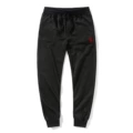 Black pants with red label
