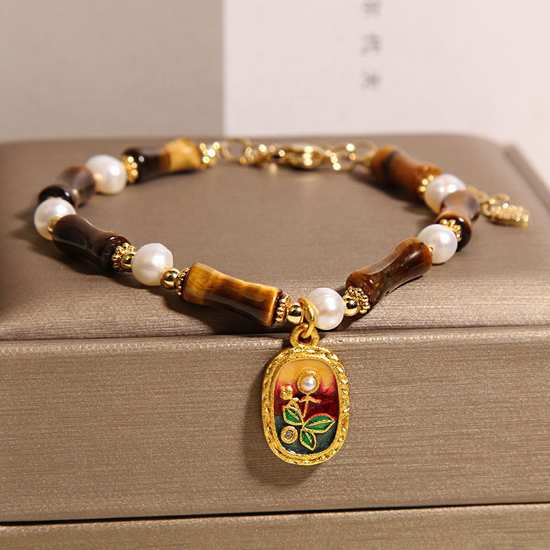 Nueva pulsera china de bambú de piedra de ojo de tigre, colgante de pintura al óleo de perlas de nicho de lujo ligero femenino, pulsera de estilo nacional, joyería de alta calidad