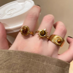 メイラードレトロゴールデンひまわりタイガーアイストーンリング新しい感覚リングニッチデザインハンドアクセサリー