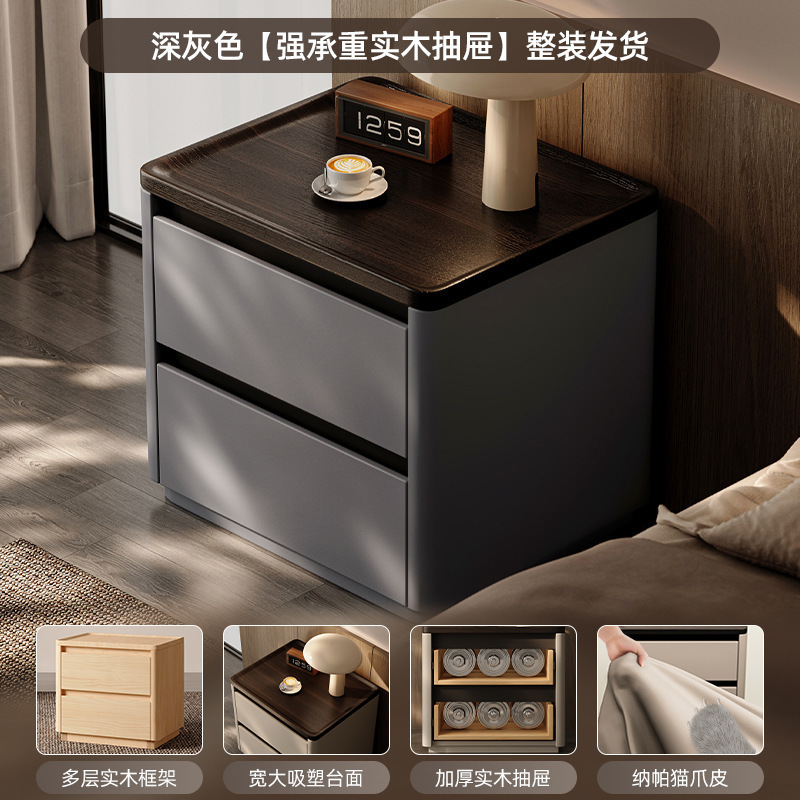 Minima mesita de cama de madera maciza2025 nuevo diseño de alta sensación de lujo ligero moderno y simple gabinete de cama de dormitorio familiar