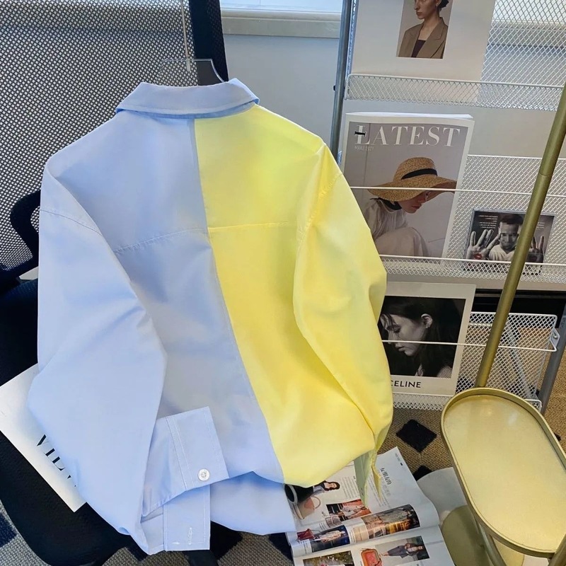 春の婦人服の色合わせのシャツの女性の長袖の韓国版のゆったりしている中の長いタイプは色の上着のデザイン感の学院の風の上着にぶつかります。|undefined