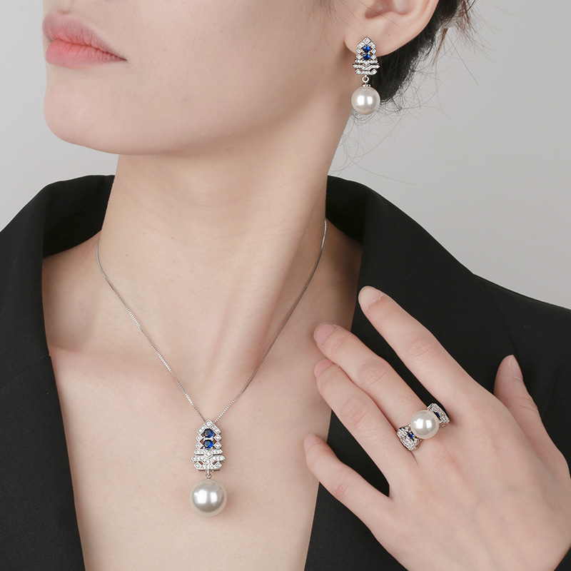 Producto popular Zhuang Shengsheng Joyas Fondo de cobre con incrustaciones de oro Conjunto de árbol de navidad de perlas blancas Mujer 16-12mm