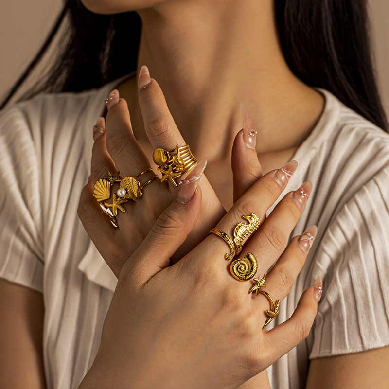 Anillo de acero inoxidable europeo y americano de diseño de nicho femenino conchas anillo de moda para mujeres joyerías