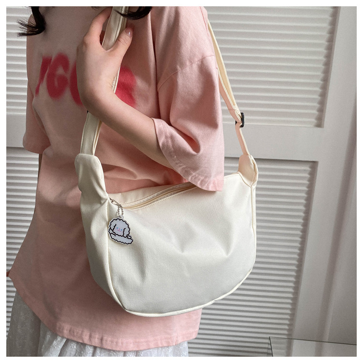 Large capacity canvas shoulder for women in spring summer 2023, new solid color, simple and fashionable casual bag,_voghion.com