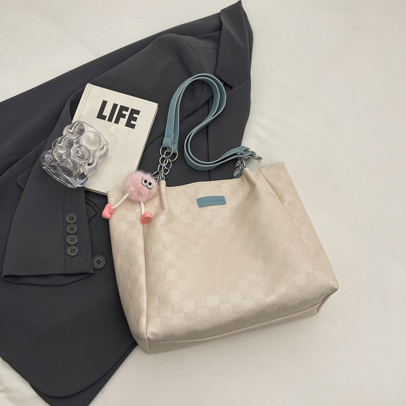 Bolsa de hombro a cuadrillas de alto nivel 2024, nueva bolsa de viaje simple de gran capacidad para estudiantes universitarios.