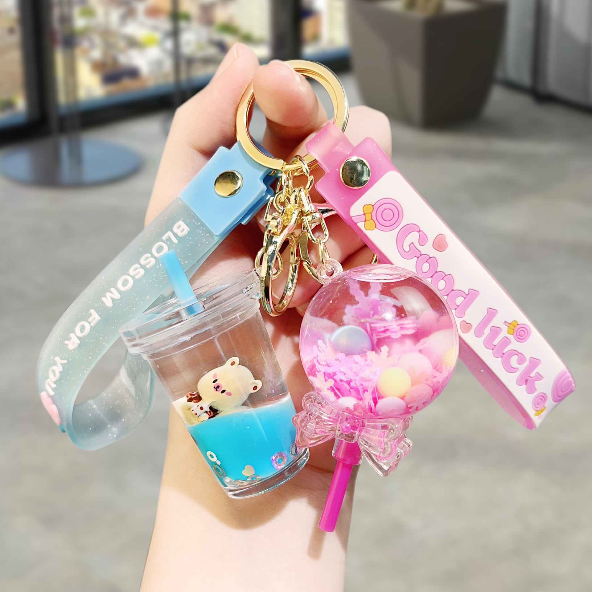 New Acrylic Creative Milk Tea Cup Lava Bottle Oil-Filling Keychain Cute Lava Backpack Pendant Key Chain
