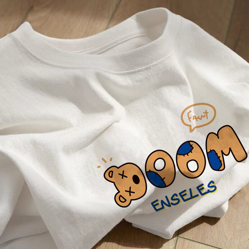 アメリカの純綿の肩の半袖のtシャツの女性2025新型の夏の大きいサイズはゆったりしています。