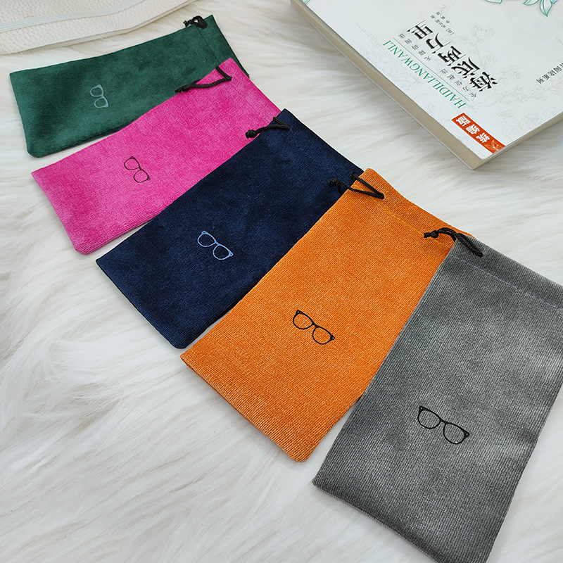 Fábrica de stock rápido de alta calidad bolsa de almacenamiento de color tela de lana bolsa de ojos bolsa de gafas de sol bolsa de cuerda de tracción bolsa de gafas