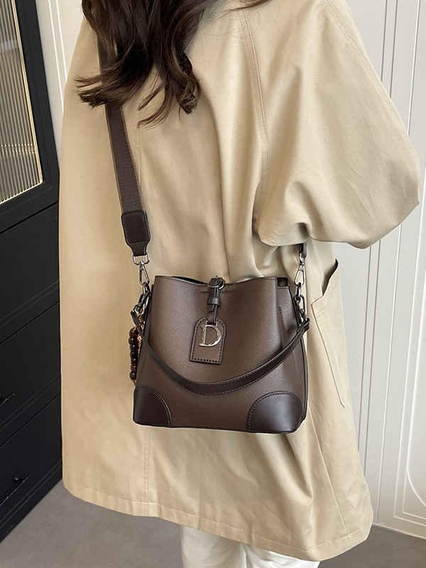 Bolso de nicho retro, bolso de moda, bolso de balde, mujer 2025, nuevo estilo de estilo extranjero, bolso de hombro, bolso de mochila coreano