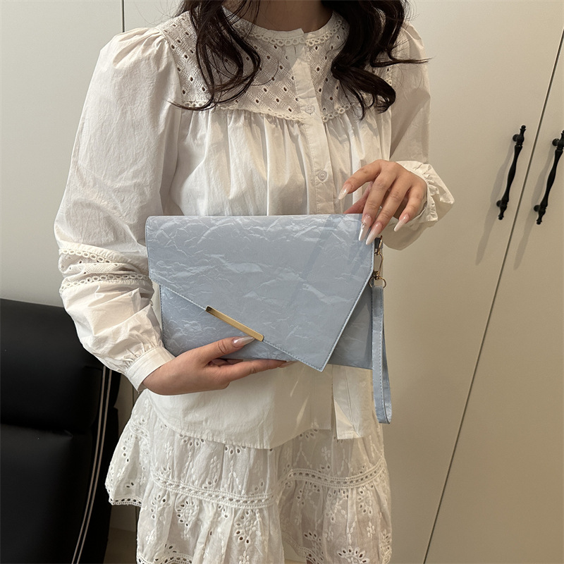 Bolsos pequeños de nicho, bolsos de mujer, nuevos embragues de todo fósforo de moda, populares de este año, embragues de alta gama, sobre