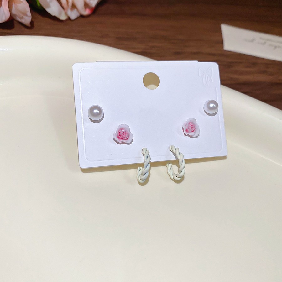 Pendientes redondos de color de aguja de plata Pendientes frescos y dulces Pendientes de todo fósforo de moda simple para mujer