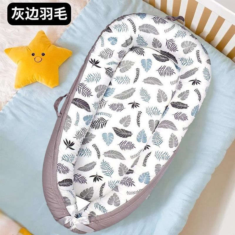 Cama de bebé portátil desmontable transfronteriza en la cama media para recién nacidos acostados para dormir