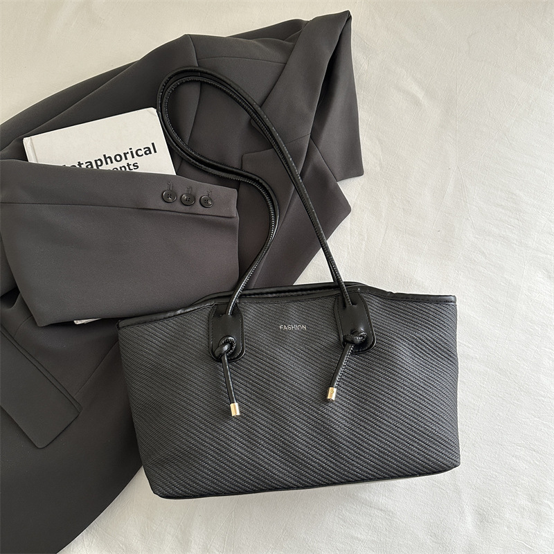 Bolso de viaje portátil primavera / verano para mujeres 2025 nuevo bolso de moda, bolso de hombro de gran capacidad, bolso de mujer de alta calidad