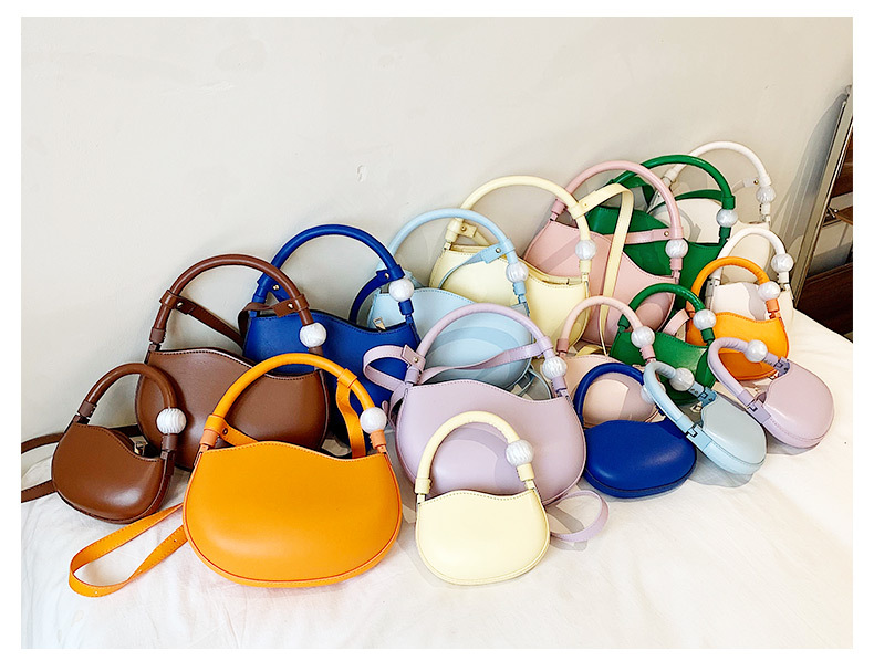 Women's Mini Pu Leather Solid Color Streetwear Oval Zipper Handbag Crossbody Bag display picture 1
