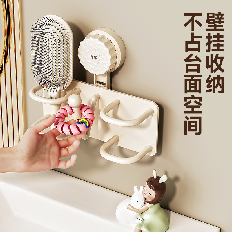 トイレの髪輪のカチューシャのひもは浴室の壁掛けの収納棚をフックします。|undefined