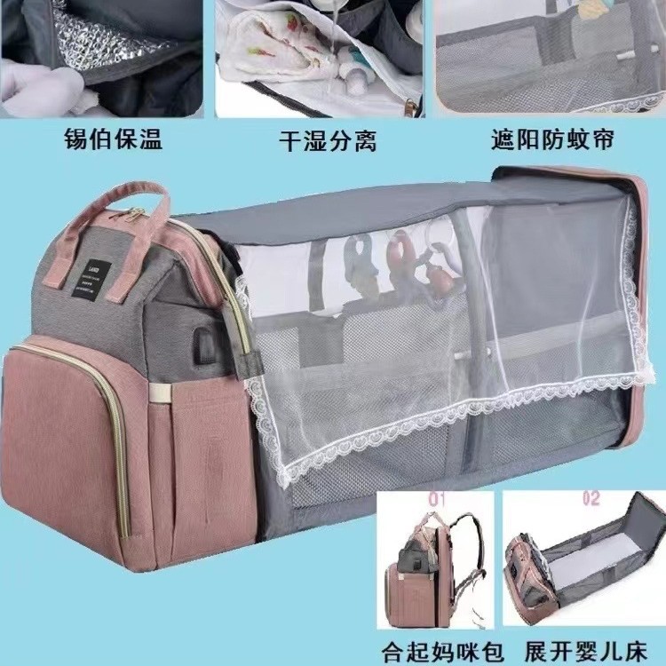 Nuevo japonés y coreano transfronterizo bolso de la momia mochila cuna mochila de gran capacidad hacia fuera bolsa de leche materna y bolsa infantil fábrica