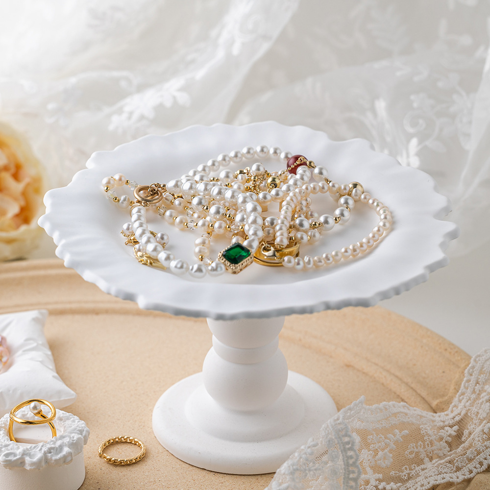Minimalist gypsum high-leg jewelry tray, decorative display platter, storage container, and photo prop for showcasing and styling accessories or jewelry.