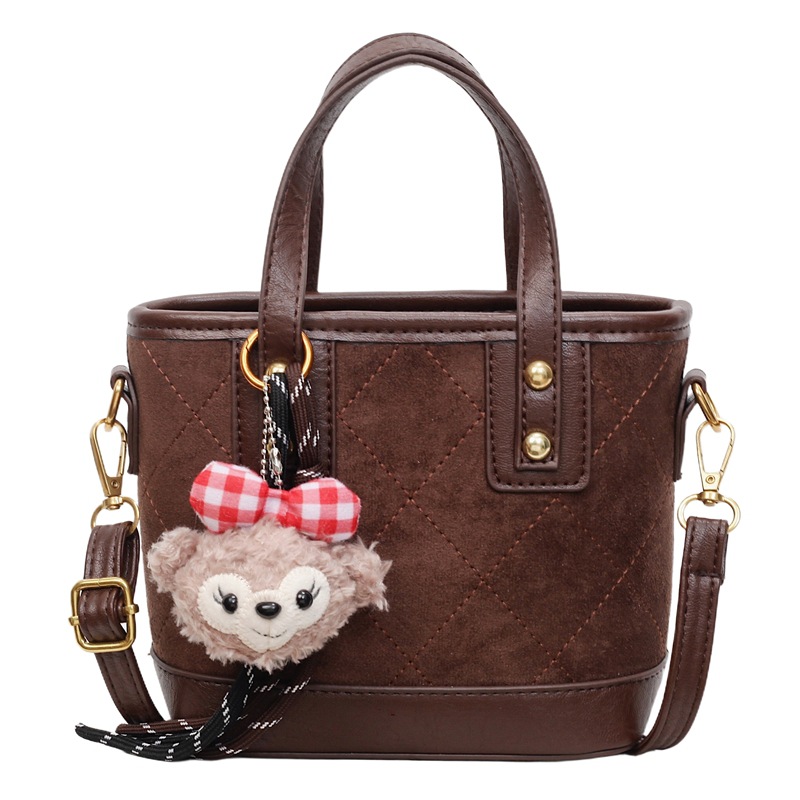 Bolso de mano de marea transfronteriza simple bolso de cubo de agua mujer otoño / invierno 2025 nuevo retro bolso de hombro bolso de viaje ocio mochila