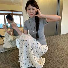 韓国系のリゾート風の蝶結びの小さい背の高い腰のまっすぐなスカートの女性のレースの花の魚の尾の半身のスカートの純粋な欲の長いスカート